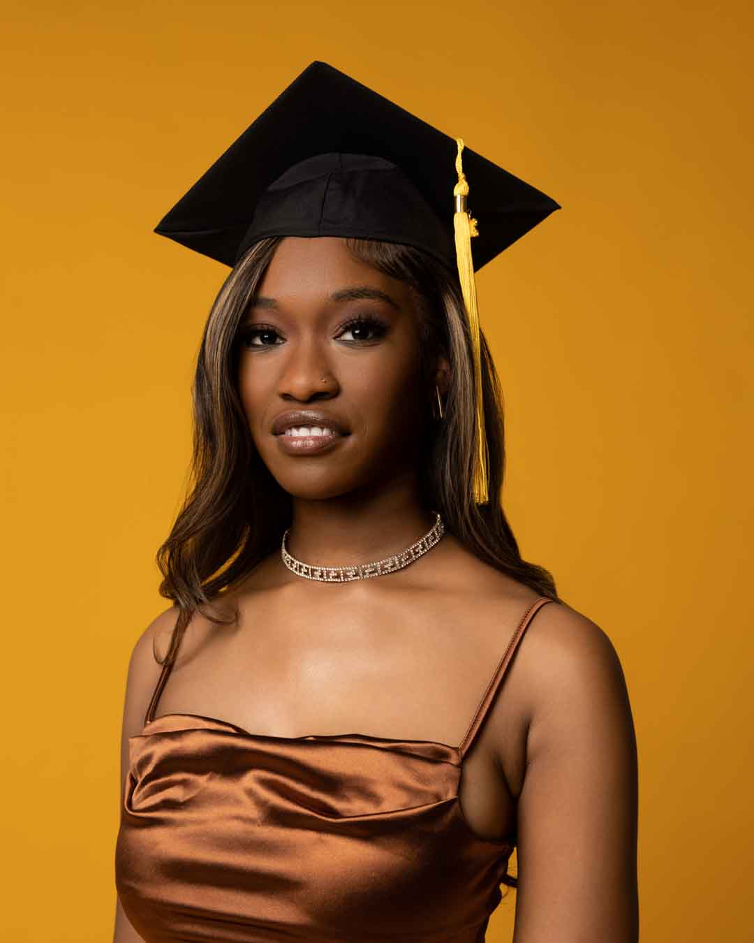 Young woman posing for a Senior Photo